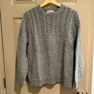 Gray cable-knit sweater